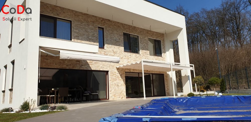 Copertina si pergola retractabila